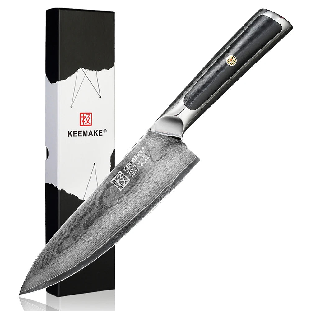 Chef's knife with black handle and KEEMAKE branding next to its packaging on a white background