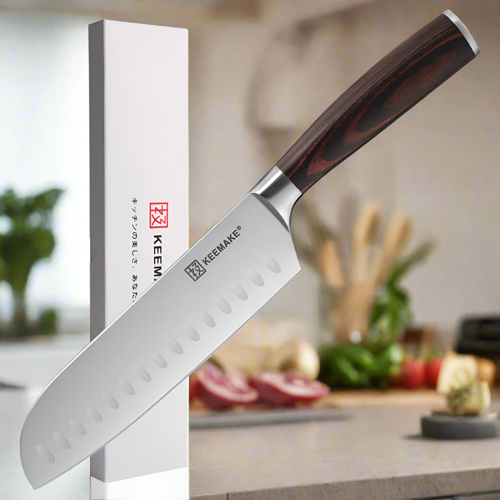Santoku knife with wooden handle and KEEMAKE branding on a white background