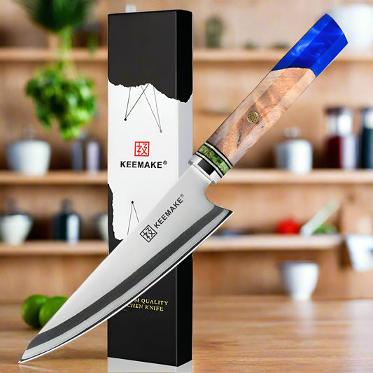 Keramake kitchen knife with wooden handle and blue accent on a white background