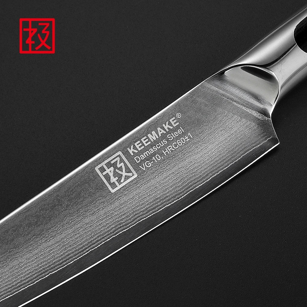 Knife with KEEMAKE branding on a dark background
