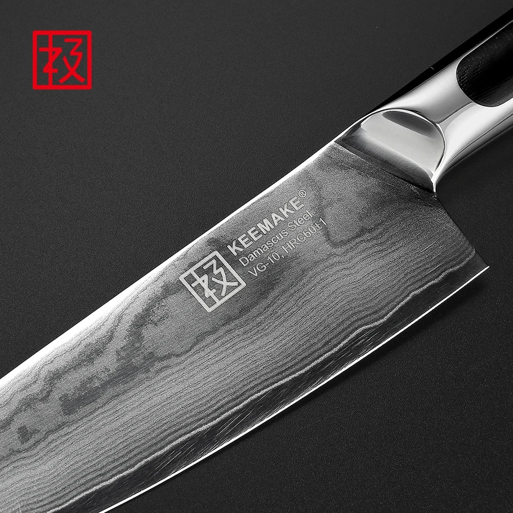 KEEMAKE knife with a black handle on a dark background