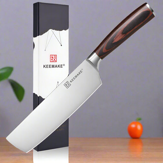 Keemake knife with wooden handle and branded packaging on a white background