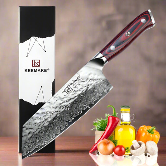 Keemake knife with packaging and kitchen items on a white background