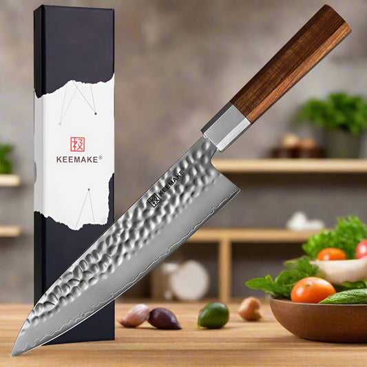 Serrated knife with wooden handle and KEEMAKE branded packaging on a white background