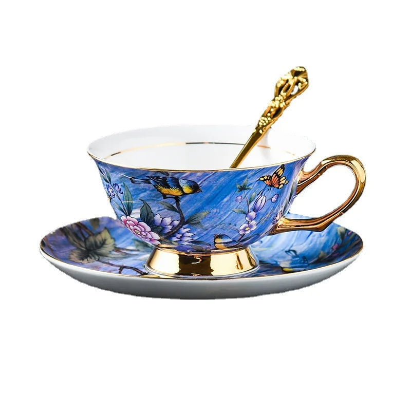 Decorative teacup with butterfly design on a white background