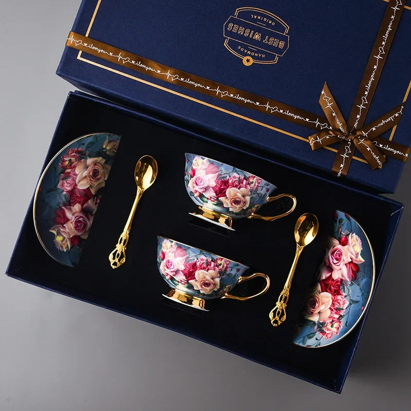 Floral teacup set with spoons and saucers in a decorative box.