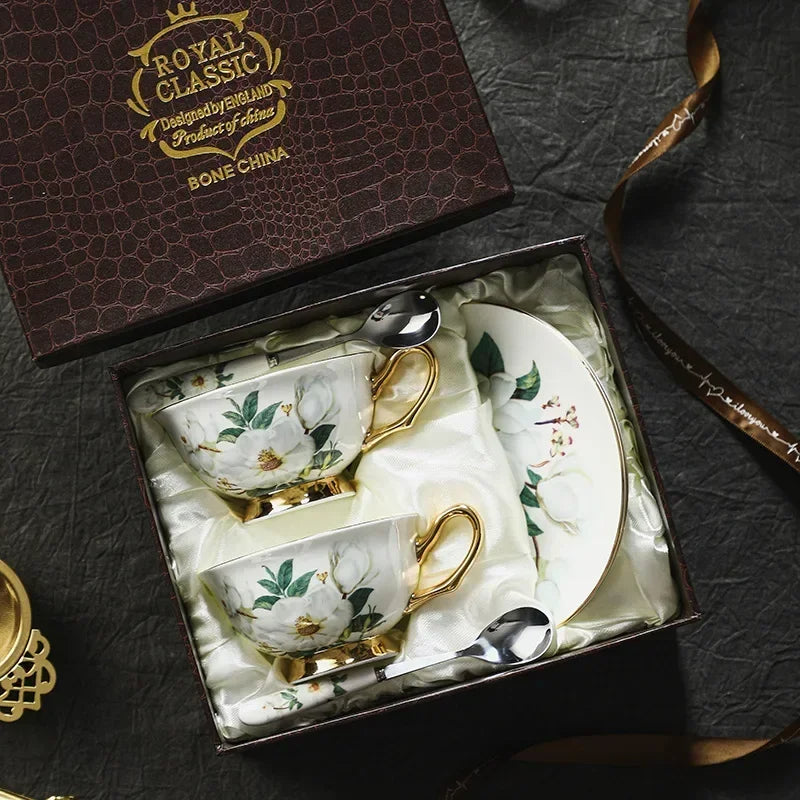 Tea set with floral design in a 'Royal Classic' box on a dark surface