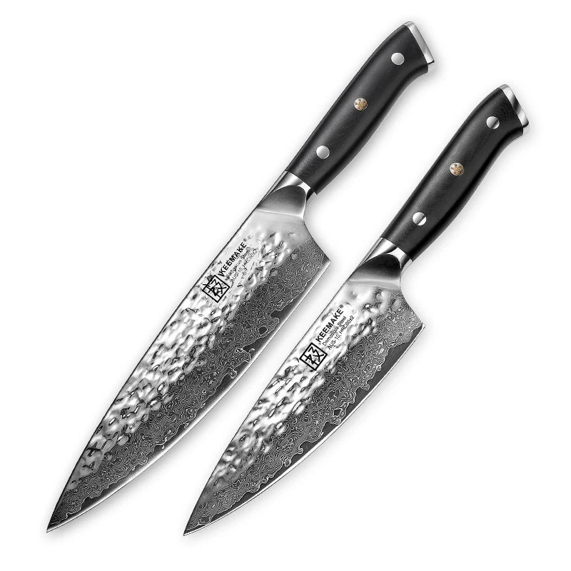 Two chef's knives with black handles on a white background